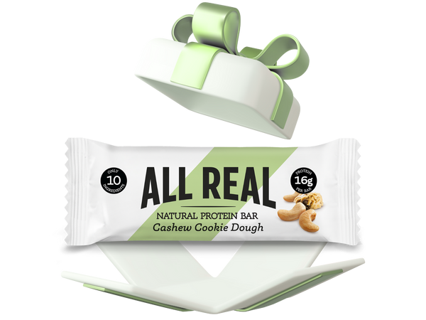 All Real protein bar with cashew cookie dough flavor on a white background