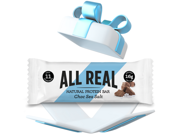 All Real protein bar with a blue ribbon on a white background
