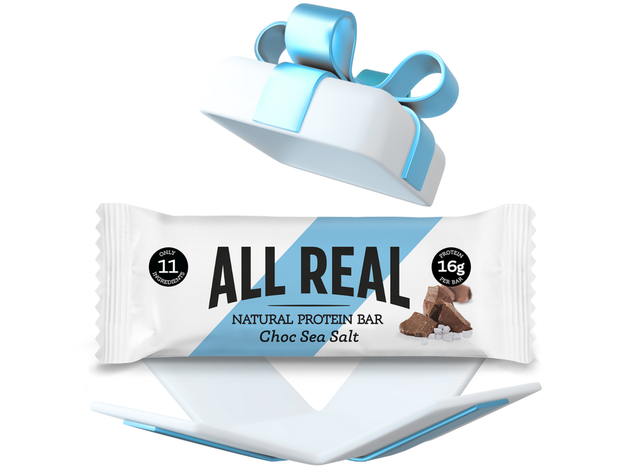 All Real protein bar with a blue ribbon on a white background