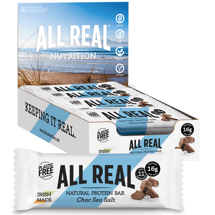 Packaging of All Real Nutrition Choc Sea Salt Protein Bars showing the box with bars and individual bar packaging with sea salt and chocolate details.