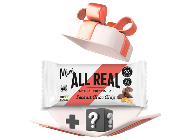 All Real protein bar with a red gift box on a white background
