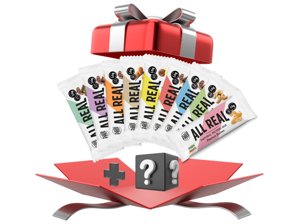 Packaging of 'ALL REAL' products with a red gift box and question mark symbol on a white background